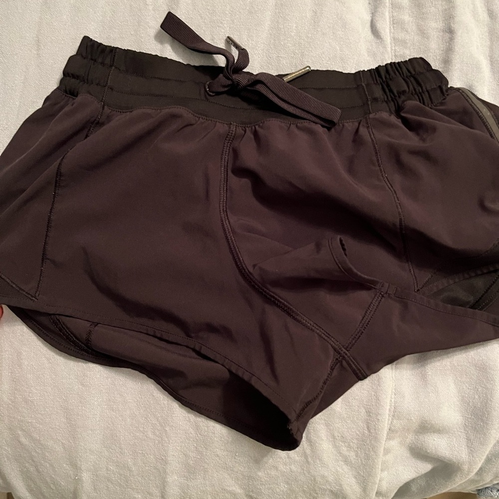 Lululemon black hotty hot shorts size 4. With drawstring - one of my fav styles!